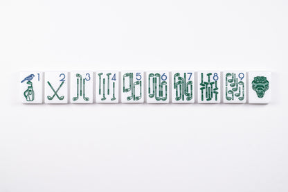 Golf-themed mahjong tiles with golf club Bams and a matching alligator Dragon. Bird Bam on a golf bag. Fancy mahjong line