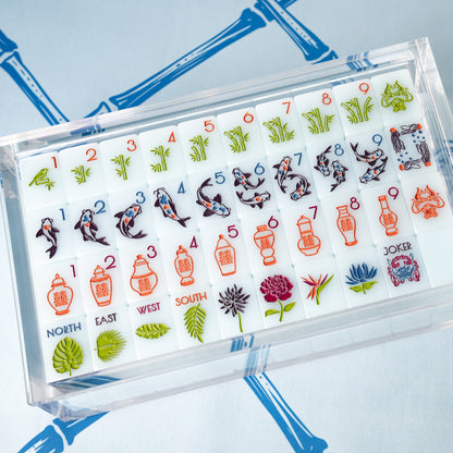 The Chinoiserie Set Mahjong Tiles in Blue Jadeite shown in Lucite Display Box